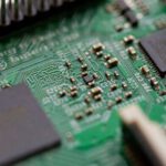 DIY Tech - tilt-shift photography of green computer motherboard
