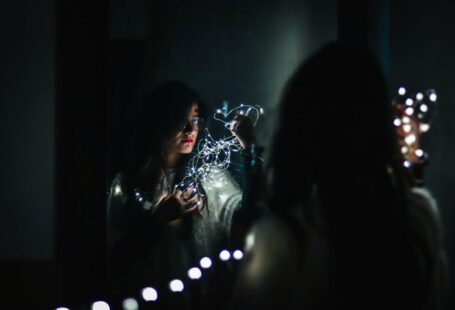 Makeup Gadgets - woman holding fairy lights