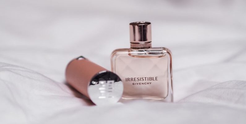 Fragrance Beauty - clear glass bottle with orange cap