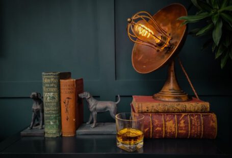 Upcycled Furniture - a table topped with books and a lamp