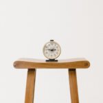 Budget Fashion - brown wooden table clock at 10 10