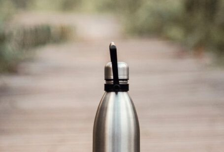 Reusable Bottle - Vacuum Flask On Brown Wooden Dock