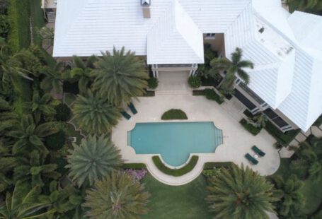 Luxury Value - aerial view photography of white house near swimming pool