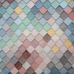 Neutral Colors - a multicolored tile wall with a pattern of small squares